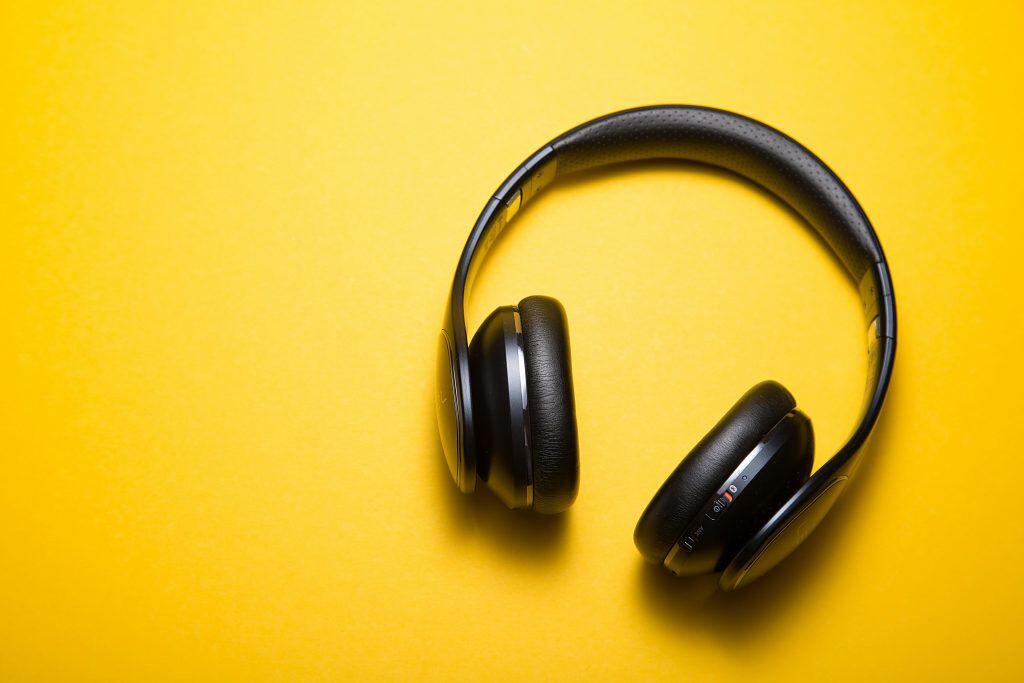 wireless earbuds, an example of a holiday gift for clients.