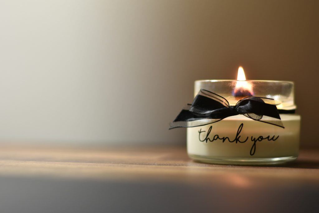 artisanal candle, an example of a holiday gift for clients.