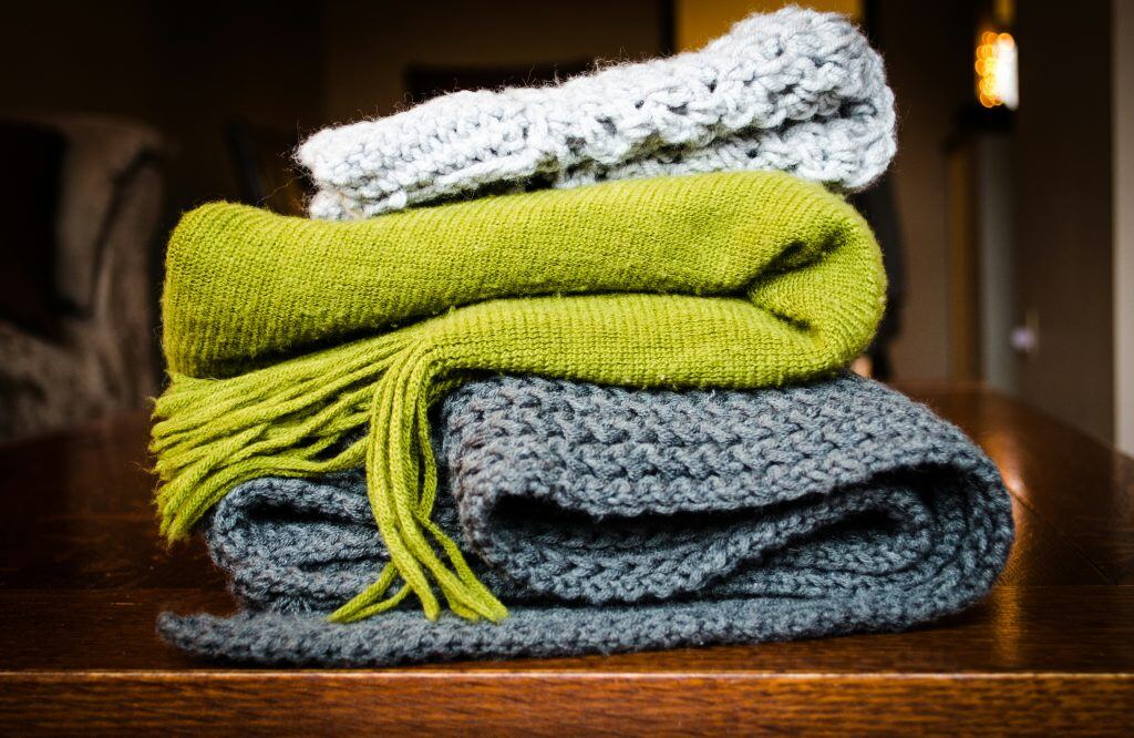 quality throw blankets, an example of a holiday gift for clients.