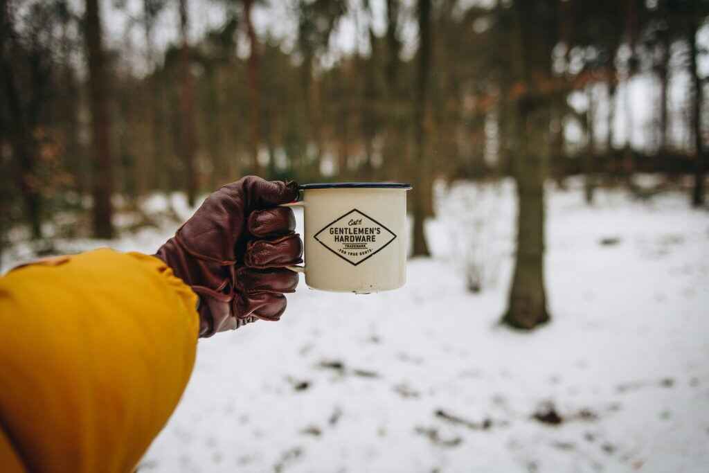 Custom coffee mug, an example of a holiday gift for clients.