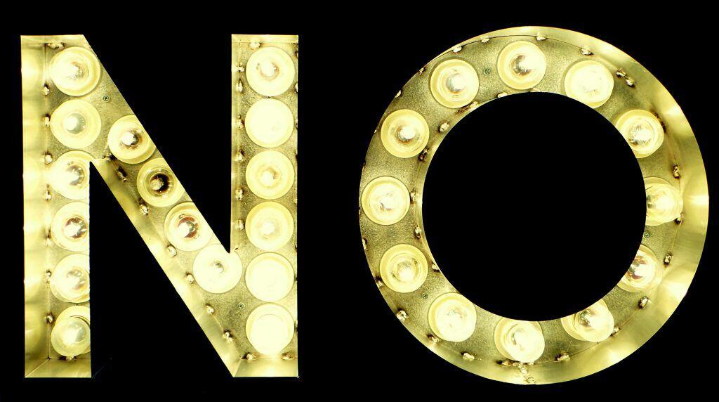 illuminated no sign, an example of how not to tell a candidate that you are unable or unwilling to write them a reference letter