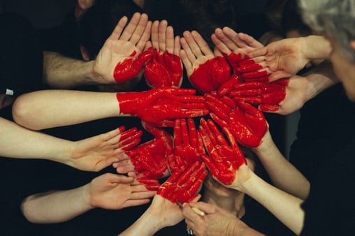 red hand hearts signifying charitable giving