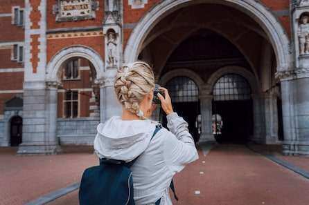 Woman tourist visiting museum in Amsterdam