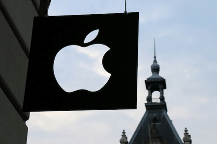 apple logo in front of building